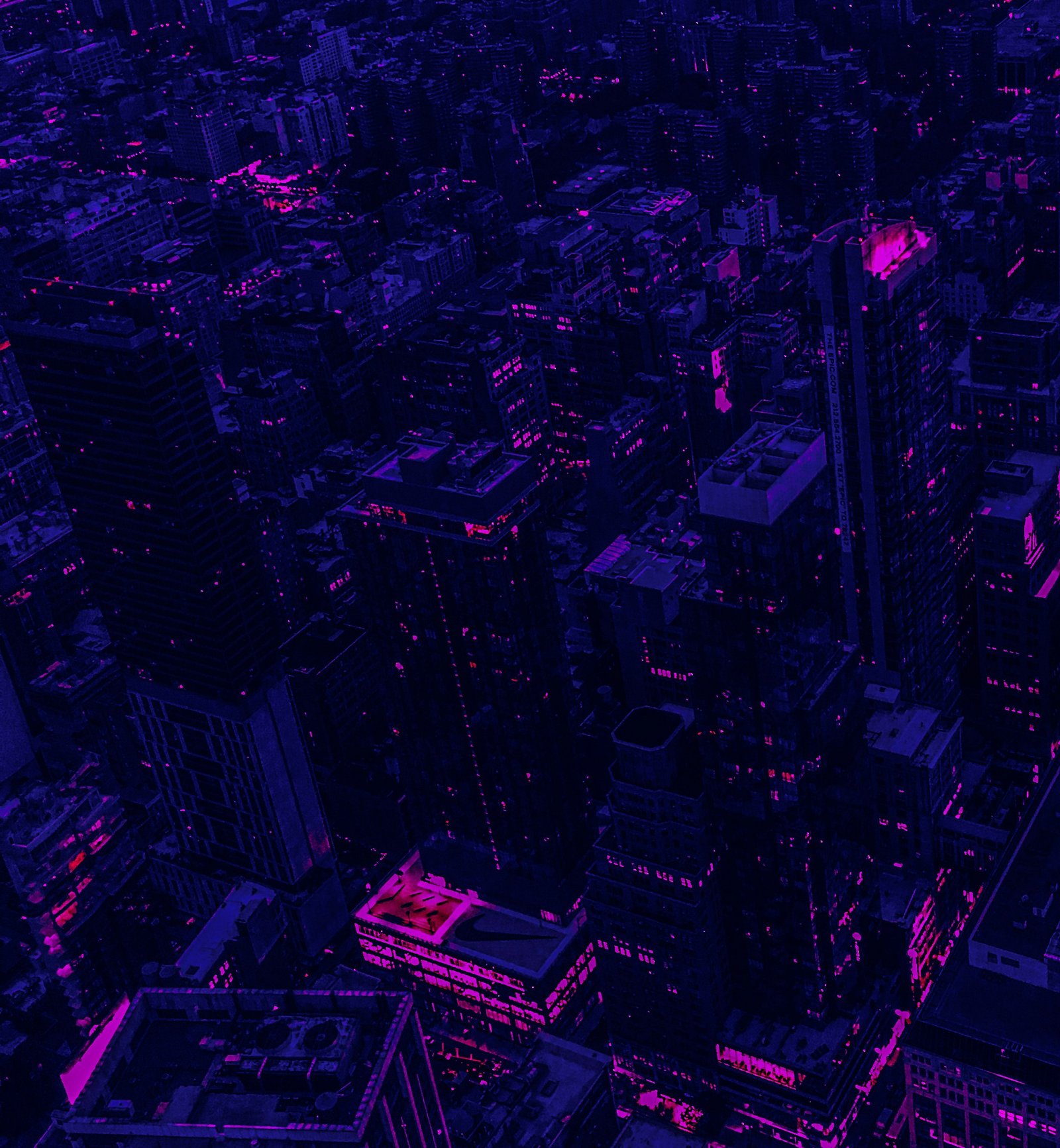 an aerial view of a city at night